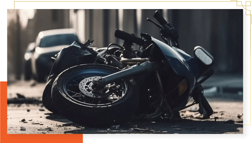 Motorcycle accident scene on a roadway, illustrating the importance of contacting a Brownsville motorcycle accident lawyer after a serious crash.
