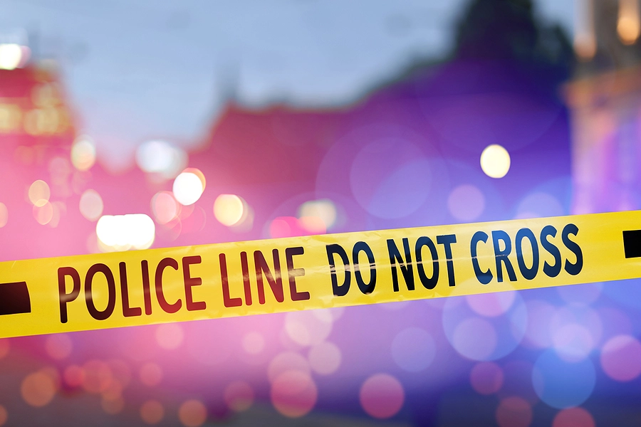 Car accident scene secured with police tape on a highway, illustrating the Rio Grande Valley’s deadliest roads where the most crashes occur.